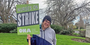 Photo of Erin Grace, Oregon Nurses Association member, holding sign that reads "Nurses on Strike. ONA"